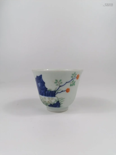 A Chinese Blue and white famille rose cup