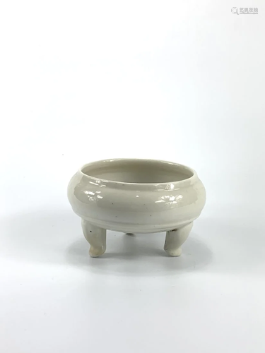 A Chinese Dehua kiln tripod censer