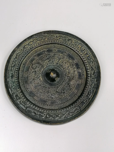 A Chinese bronze mirror