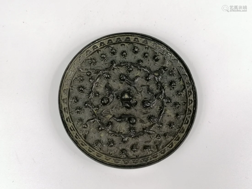 A Chinese Bronze mirror