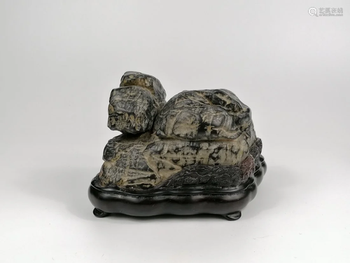 A RARE Chinese brush rest stone