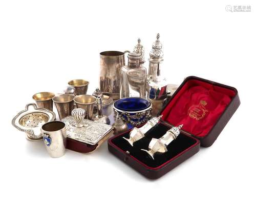 A mixed lot, comprising silver items: two George III pepper ...