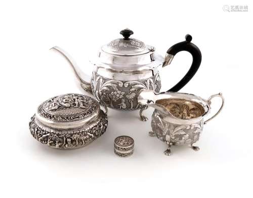 A mixed lot of metalware, comprising: an Indian teapot and c...