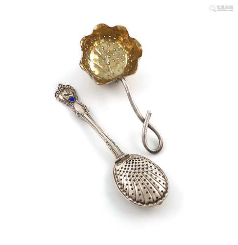 An American parcel-gilt silver tea strainer, by George Shieb...