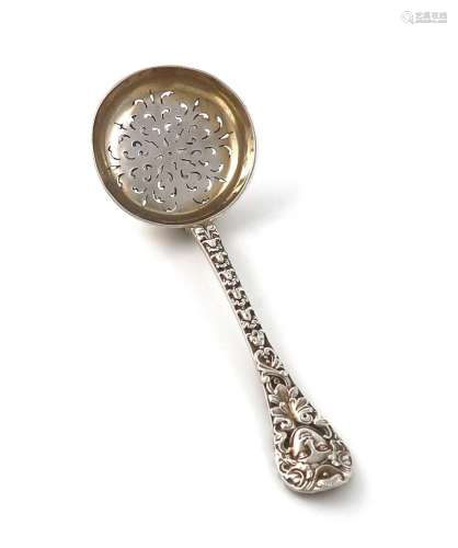 A Victorian cast silver sugar sifting spoon, by Henry Curry,...