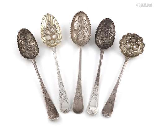 A collection of four silver tablespoons with later berry dec...