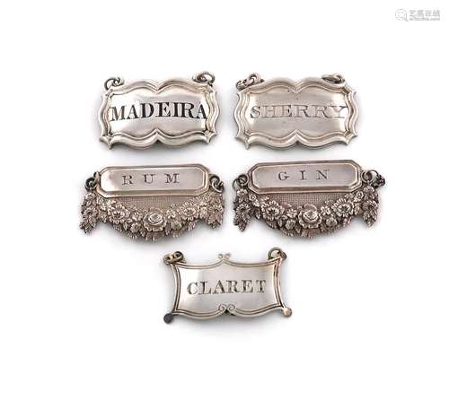 A collection of five antique silver wine labels, comprising:...