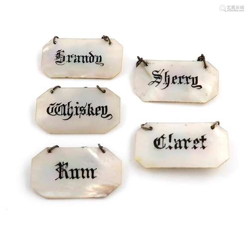 A set of five late Victorian mother-of-pearl wine labels, un...