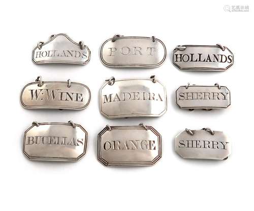 A collection of nine antique silver wine labels, plain recta...