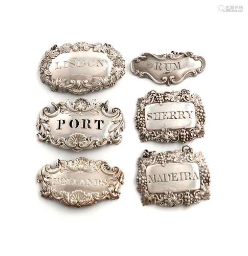 A collection of six early 19th century silver wine labels, c...