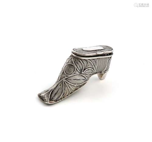 A silver filigree shoe, unmarked, the hinged cover with an o...
