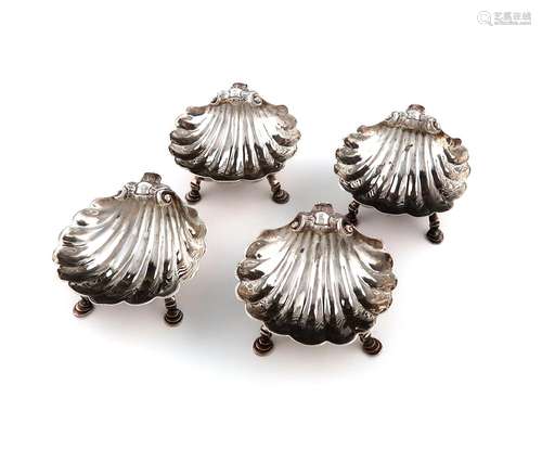 A set of four George II silver salt cellars, by Edward Aldri...