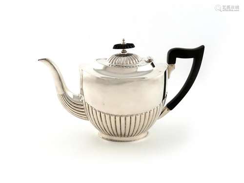 A silver teapot, by E. Viner, Sheffield 1919, oval form, par...