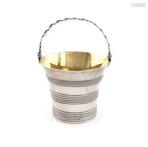 A mid 18th century silver swing-handled cream pail, makers m...