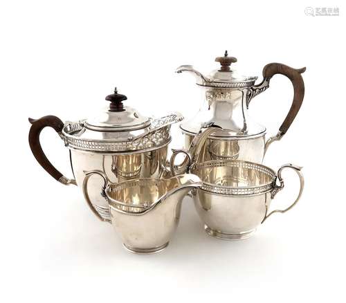 A matched four-piece silver tea set, by James Deakin & S...