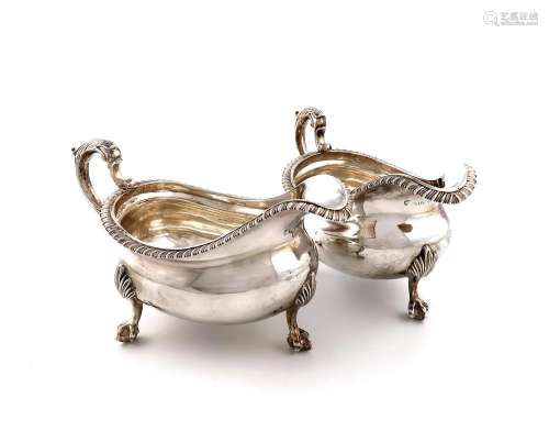 A pair of George III silver sauce boats, by Emes and Barnard...