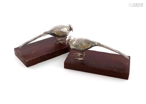 A pair of metalware and enamel models of birds, unmarked, mo...