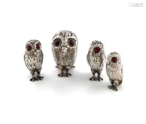 A four-piece Victorian novelty silver owl cruet set, by Geor...