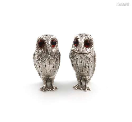 A pair of modern novelty silver owl salt and pepper pots, by...