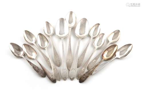 A collection of antique Irish silver Celtic pattern flatware...