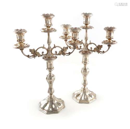 A pair of modern Irish silver three-light candelabra, by Roy...