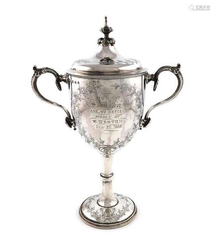 A Victorian presentation silver two-handled cup and cover, b...