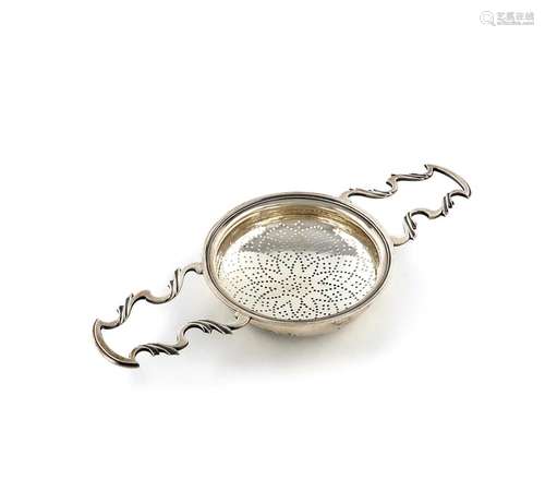 A George III two-handled silver lemon strainer, by William P...