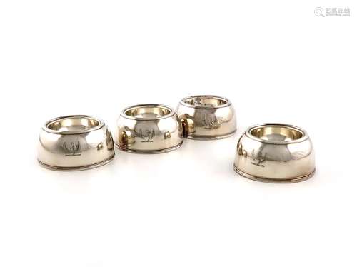 A set of four George I silver trencher salt cellars, by Will...