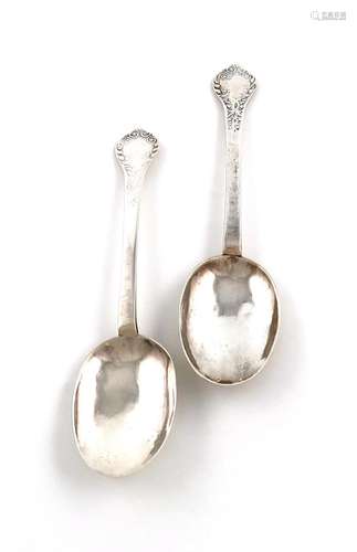 A pair of Charles II silver Lace-back Trefid spoons, by John...