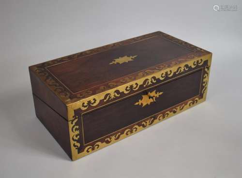 A Regency Rosewood Writing Slope with Inlaid Brass Edging an...