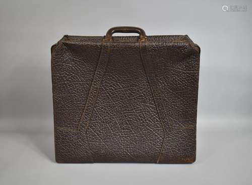 A 1930s Elephant Hide Suitcase with Brass Fittings, 48x56cms...