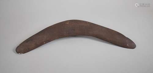 An Aboriginal Carved Wooden Boomerang, 53cms Wide