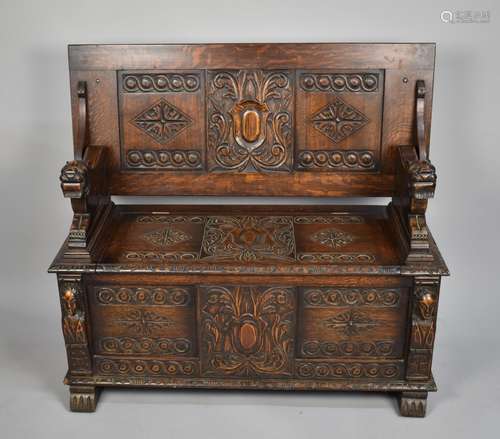 A Carved Oak Monks Bench with Hinged Seat and Having Heavily...