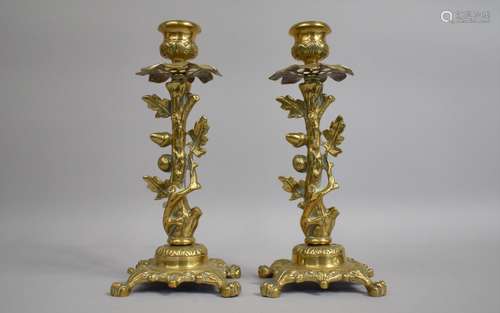 A Pair of Late 19th Century Cast Brass Candlesticks in the f...