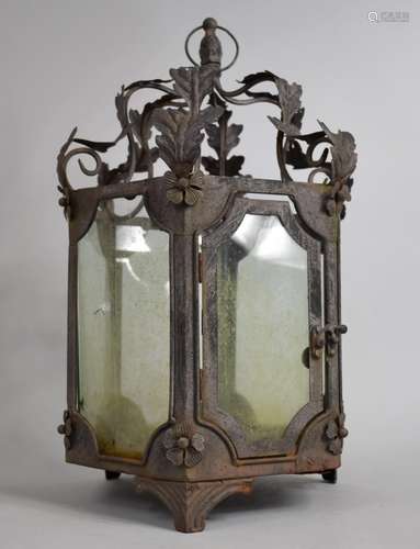 An Iron Framed Six Panel Lantern Decorated in a Floral Motif...