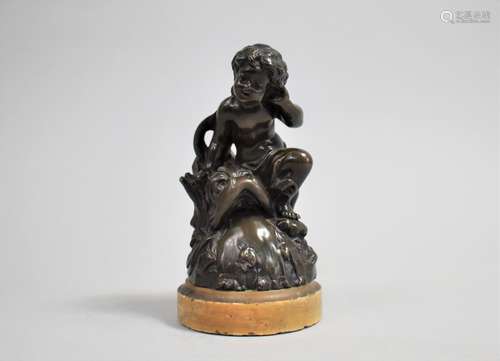 A Bronze Figure of a Water Nymph, Sitting on Rocks with Reed...