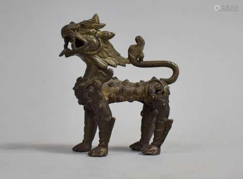 A 19th Century Tibetan Bronze Study of a Temple Lion, Modell...