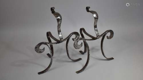 A Pair of Arts and Crafts Wrought Iron Fire Dogs, 33cms High