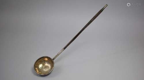 A Georgian White Metal and Baleen handled Toddy Ladle set wi...