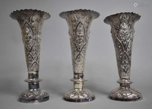 A Set of Three Indian Silver Trumpet Vases with Hammered Rep...