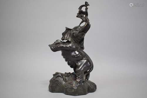 A 20th Century Chinese Cast Bronze Model of a Rearing Elepha...