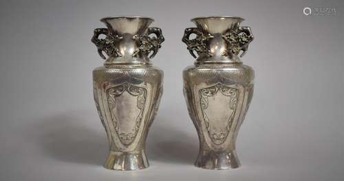 A Pair of Chinese Silver Vases Decorated with Panels Depicti...