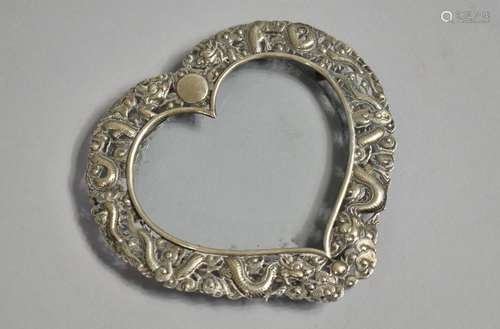 A Chinese Silver Heart Shaped Photo Frame with Repousse deco...