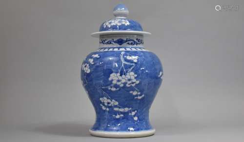 A 19th Century Blue and White Prunus Pattern Vase and Cover,...