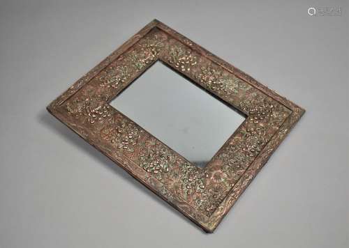 An Oriental Silver Plate on Copper Mirror, Silver Completely...