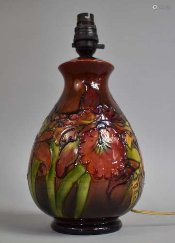 A Moorcroft Table Lamp of Baluster Form, Red Ground, Impress...