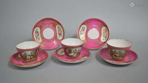 A Set of Three 18th Century Sevres Teacups on Pink Ground wi...