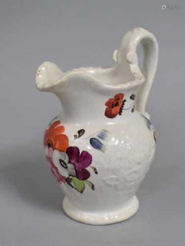 An Early 19th Century Swansea Creamware Jug with floral pain...