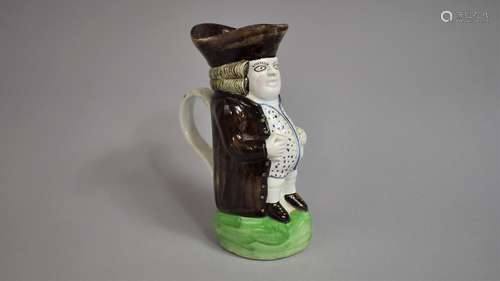 An Early English Pearlware Toby Jug, Green Spongeware Base, ...