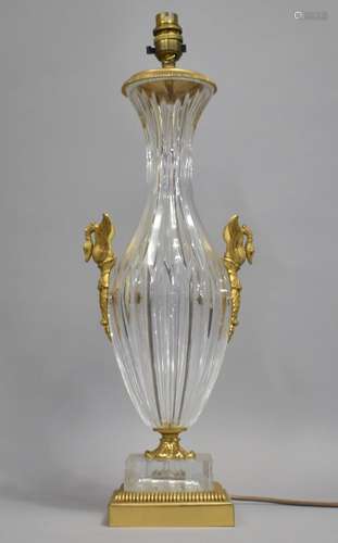 A Cut Glass and Gilt Metal Mounted Table Lamp with twin swan...